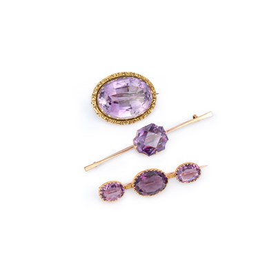 Lot 624 - THREE VICTORIAN AMETHYST BROOCHES