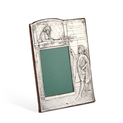 Lot 286 - AN EARLY 20TH CENTURY SILVER-MOUNTED 'ROMEO AND JULIET' PHOTOGRAPH FRAME