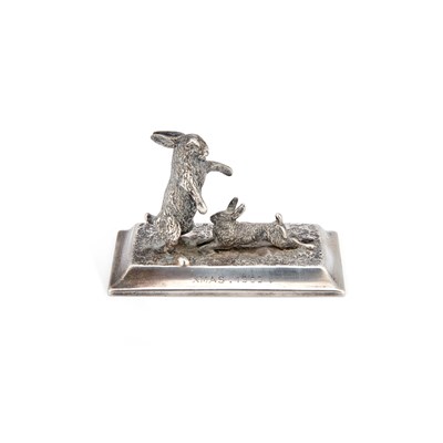 Lot 268 - AN EDWARDIAN SILVER MODEL OF HARES