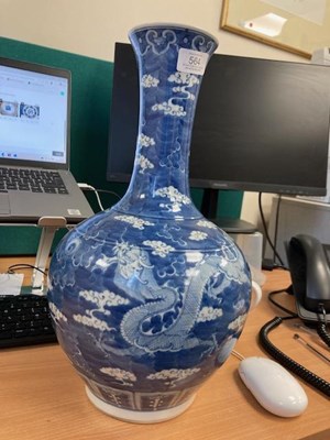 Lot 473 - A CHINESE BLUE AND WHITE PORCELAIN BOTTLE VASE