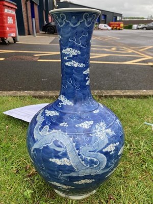 Lot 473 - A CHINESE BLUE AND WHITE PORCELAIN BOTTLE VASE