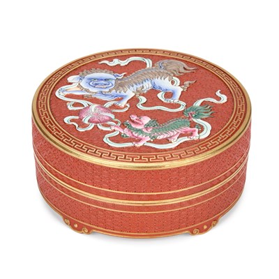 Lot 512 - A CHINESE PORCELAIN ‘CINNABAR LACQUER’ CIRCULAR BOX AND COVER