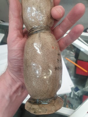 Lot 511 - A CHINESE GOURD SCROLL WEIGHT