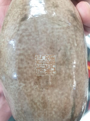 Lot 511 - A CHINESE GOURD SCROLL WEIGHT