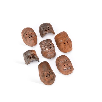 Lot 528 - A GROUP OF ONKO-YAKI CERAMIC NOH MASK NETSUKE