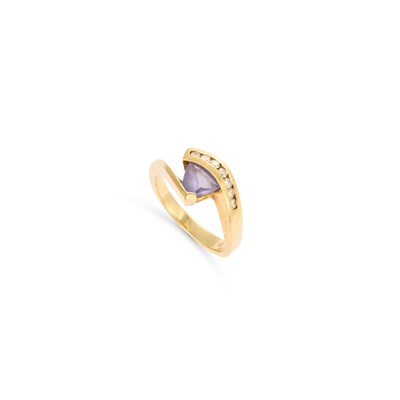 Lot 643 - A TANZANITE AND DIAMOND RING