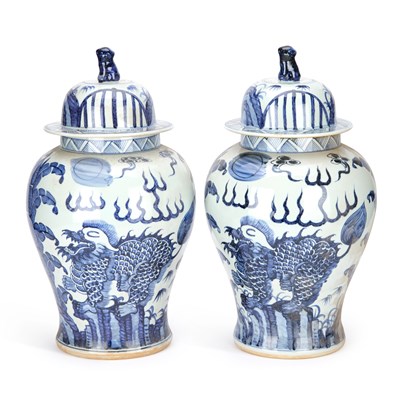 Lot 716 - A PAIR OF CHINESE JARS AND COVERS