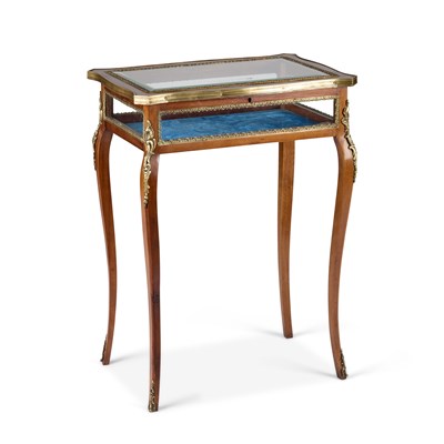 Lot 1204 - A LOUIS XV STYLE GILT-METAL MOUNTED WALNUT BIJOUTERIE TABLE