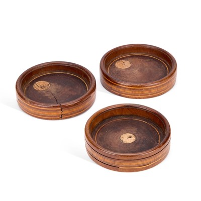 Lot 1085 - THREE GEORGE III YEW WOOD AND SATINWOOD-BANDED WINE COASTERS