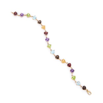 Lot 657 - A 9 CARAT GOLD HEART-CUT GEM-SET BRACELET