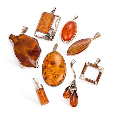 Lot 679 - A COLLECTION OF SILVER AMBER PENDANTS