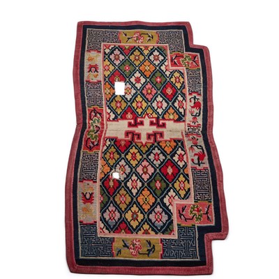 Lot 962 - A TIBETNA SADDLE CLOTH