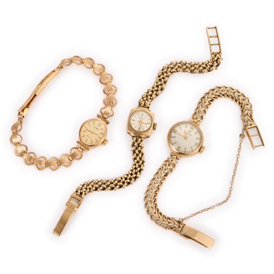 Lot 628 - THREE LADY'S 9CT GOLD BRACELET WATCHES