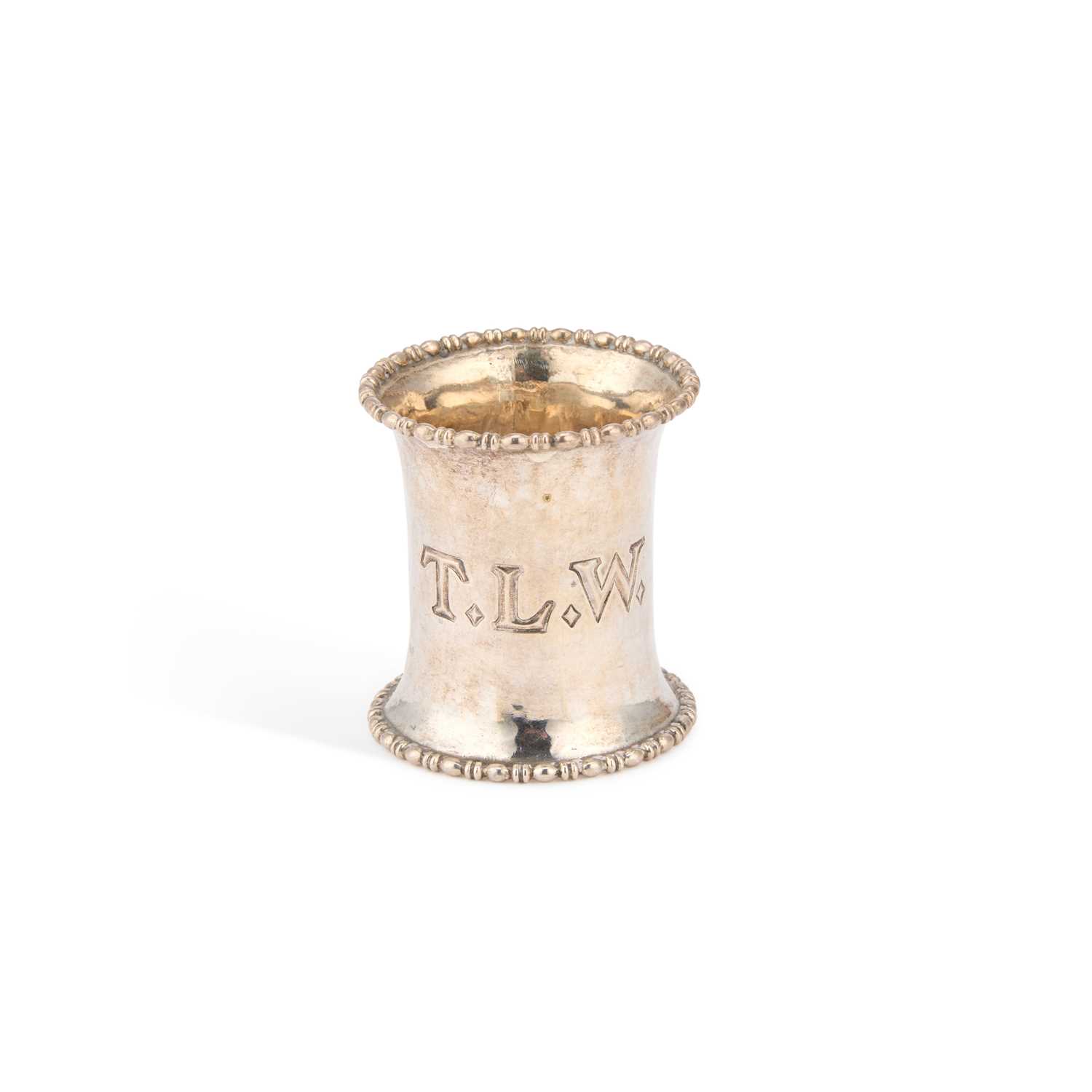 Lot 375 - OMAR RAMSDEN, AN ARTS AND CRAFTS SILVER NAPKIN RING