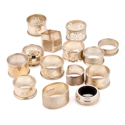 Lot 352 - A COLLECTION OF THIRTEEN SILVER NAPKIN RINGS