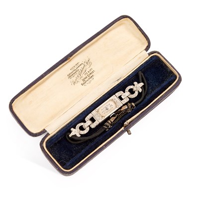 Lot 629 - A PLATINUM DIAMOND-SET COCKTAIL WATCH