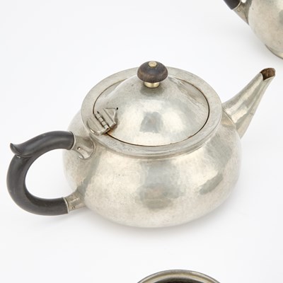 Lot 245 - A LIBERTY & CO TUDRIC PEWTER FOUR-PIECE TEA SERVICE