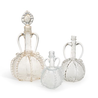Lot 79 - THREE DUTCH ENGRAVED GLASS DECANTERS