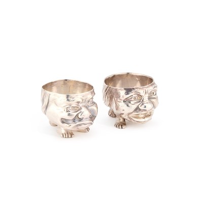 Lot 449 - A PAIR OF VICTORIAN SILVER GROTESQUE HEAD SALTS