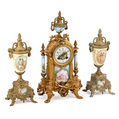 Lot 1151 - A FRENCH GILT-METAL AND PORCELAIN THREE-PIECE CLOCK GARNITURE
