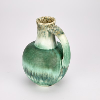 Lot 77 - A RUSKIN GREEN-GLAZED CRYSTALLINE POTTERY JUG