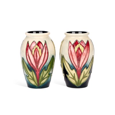 Lot 155 - A PAIR OF MOORCROFT 'CROCUS' TRIAL VASES