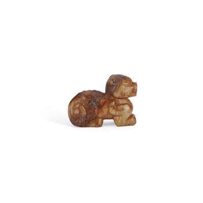Lot 534 - A CHINESE JADE CARVING OF A RECUMBENT MYTHICAL BEAST