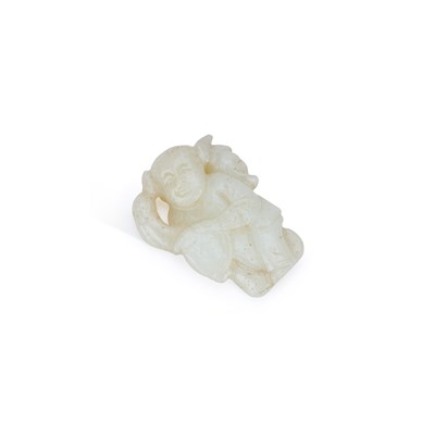 Lot 540 - A CHINESE WHITE JADE CARVING OF A BOY RIDING A HOBBY HORSE