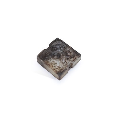 Lot 554 - A CHINESE BLACK JADE PENDANT