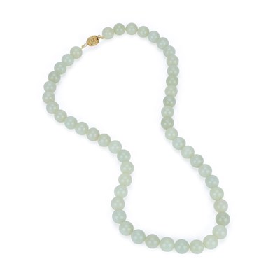Lot 852 - A CHINESE PALE CELADON JADE BEAD NECKLACE