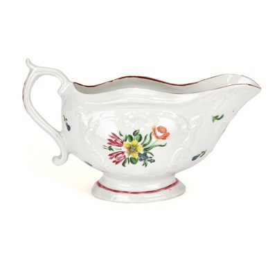Lot 172 - A BRISTOL PORCELAIN SAUCEBOAT