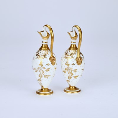 Lot 79 - A PAIR OF ENGLISH PORCELAIN EWERS