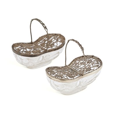 Lot 561 - A NEAR PAIR OF EDWARDIAN SILVER-MOUNTED 'ROCK CRYSTAL' POT POURRI BASKETS