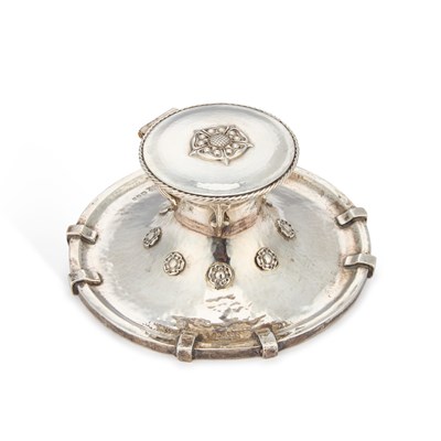Lot 472 - A LARGE ARTS AND CRAFTS SILVER PLANISHED CIRCULAR INKWELL