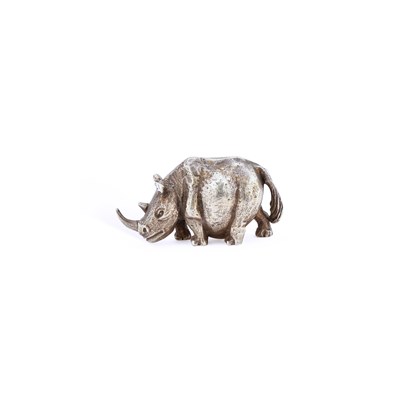 Lot 447 - AN ELIZABETH II CAST SILVER-GILT RHINOCEROS