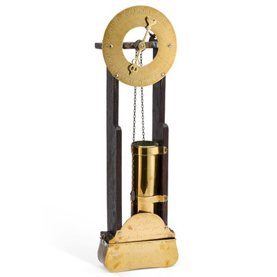 Lot 985 - AN OAK AND BRASS WATER CLOCK