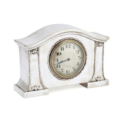 Lot 253 - AN ARTS AND CRAFTS SILVER-PLATED MANTEL CLOCK