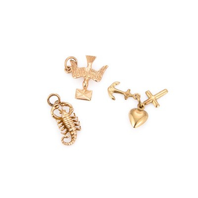 Lot 893 - THREE 9CT YELLOW GOLD CHARMS