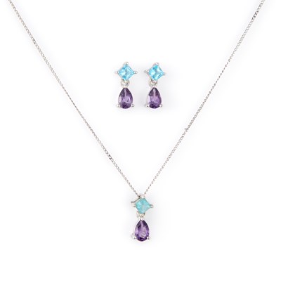 Lot 829 - AN AMETHYST AND TOPAZ PENDANT AND EARRING SET