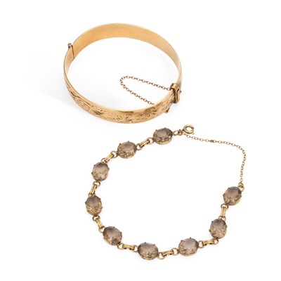 Lot 914 - TWO ROLLED GOLD BRACELETS