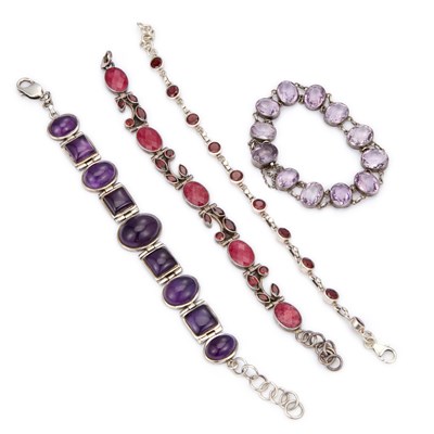 Lot 924 - A GROUP OF SILVER GEM-SET BRACELETS