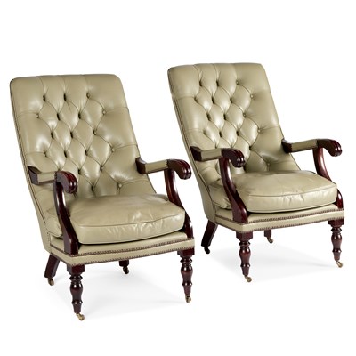 Lot 1035 - A PAIR OF GREEN LEATHER UPHOLSTERED BUTTON-BACK LIBRARY CHAIRS