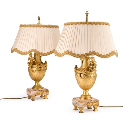 Lot 1133 - A PAIR OF NEOCLASSICAL REVIVAL GILT-METAL AND MARBLE TABLE LAMPS