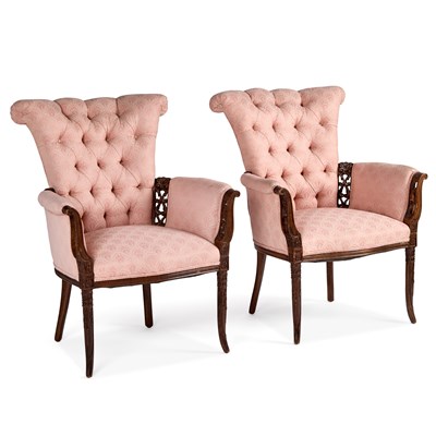 Lot 1171 - A PAIR OF CARVED AND UPHOLSTERED BUTTON-BACK ARMCHAIRS