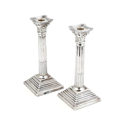 Lot 551 - A PAIR OF ELIZABETH II SILVER CORINTHIAN COLUMN CANDLESTICKS