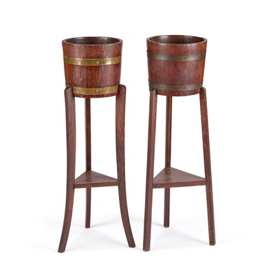 Lot 1172 - A PAIR OF LISTER OAK PLANTERS ON STANDS