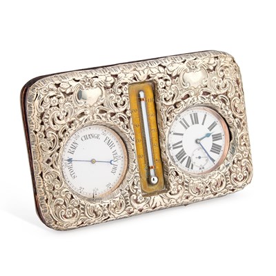 Lot 545 - AN EDWARDIAN SILVER-MOUNTED DESKTOP CLOCK AND WEATHER STATION
