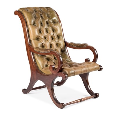 Lot 1008 - A REGENCY STYLE DEEP-BUTTONED LEATHER AND MAHOGANY OPEN ARMCHAIR