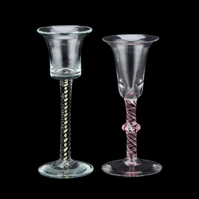 Lot 87 - A RED COLOUR TWIST WINE GLASS
