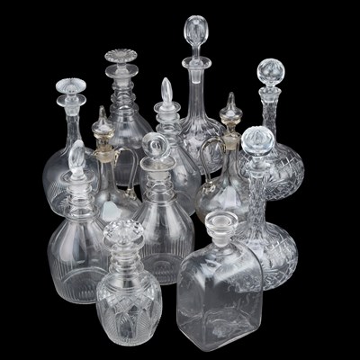 Lot 107 - A COLLECTION OF TWELVE DECANTERS AND CLARET JUGS